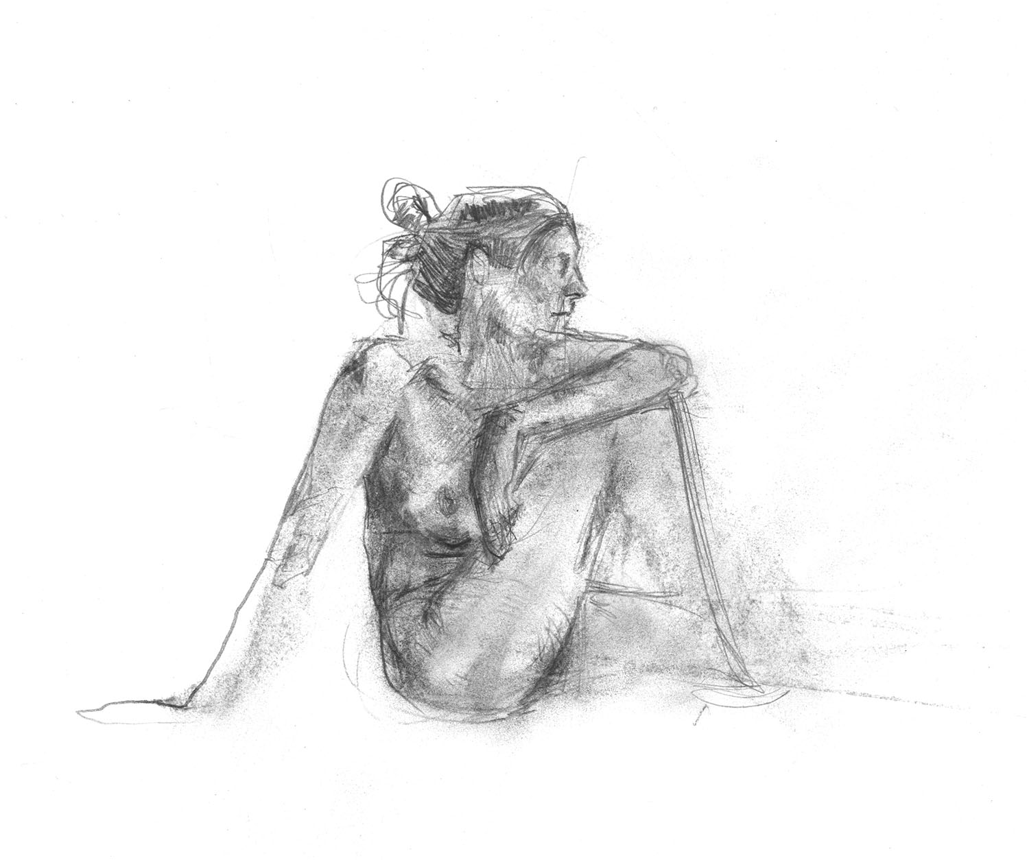 Female model standing with hands together.
