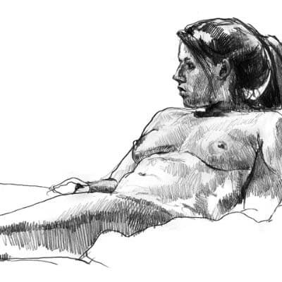 Model laying down looking off into the distance